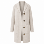 Cream longline knit cardigan with shawl collar, button front and patch pockets