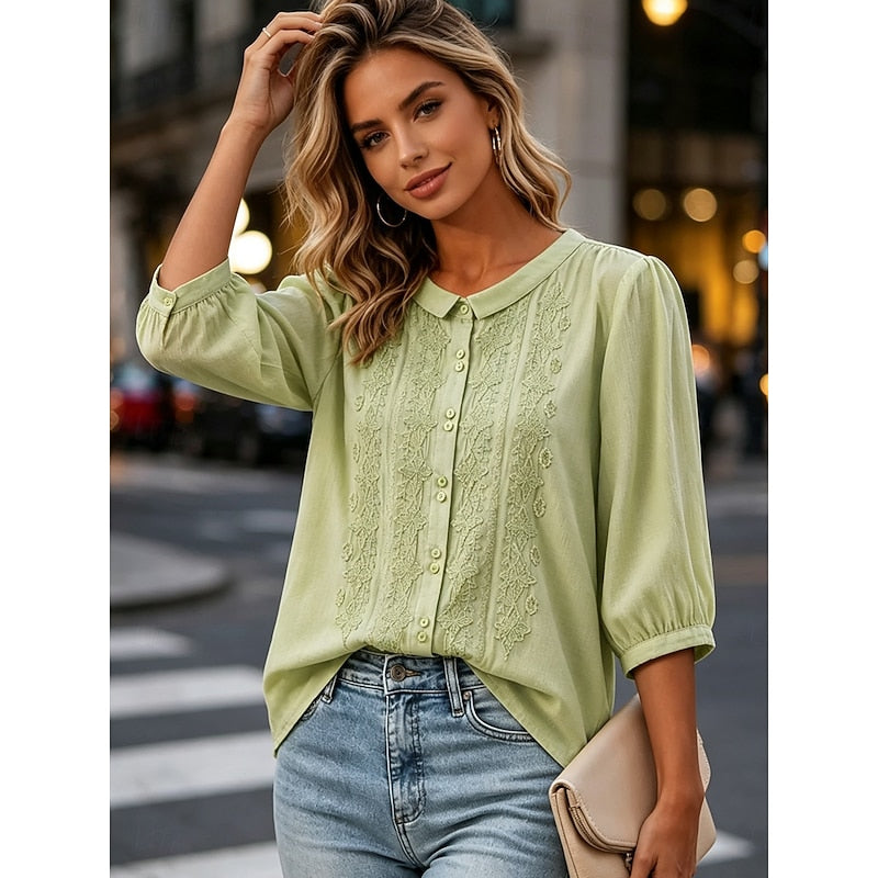 Light green embroidered blouse with peter pan collar and button-front, loose puff sleeves