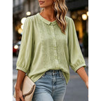 Light green embroidered blouse with peter pan collar and button-front, gathered 3/4 sleeves