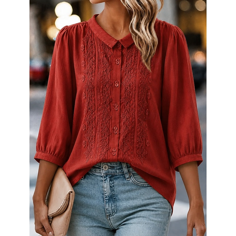 Rust red embroidered blouse with peter pan collar and button-front, puff sleeves