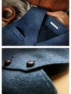 Blue sleeveless vest fabric close-up with brown button details and textured weave