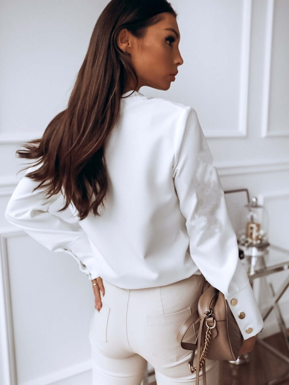Danore white high-cuff blouse, side view, button placket and snap-style cuffs