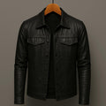 Black leather motorcycle-style jacket with button front and two chest flap pockets.
