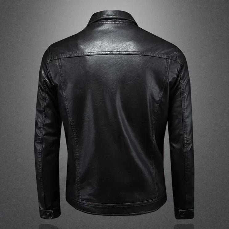 Black leather motorcycle-style jacket back view with center seams and two side pockets.