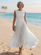 White sleeveless pleated A-line midi dress with draped neckline and fitted waist