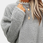 Gray teddy pocket tunic dress with long sleeves and buttoned crew neckline detail