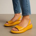 Women's slingback sandals, yellow open-toe slip-on with cushioned footbed.