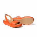 Women's slingback sandals, orange open-toe slip-on with cushioned footbed.