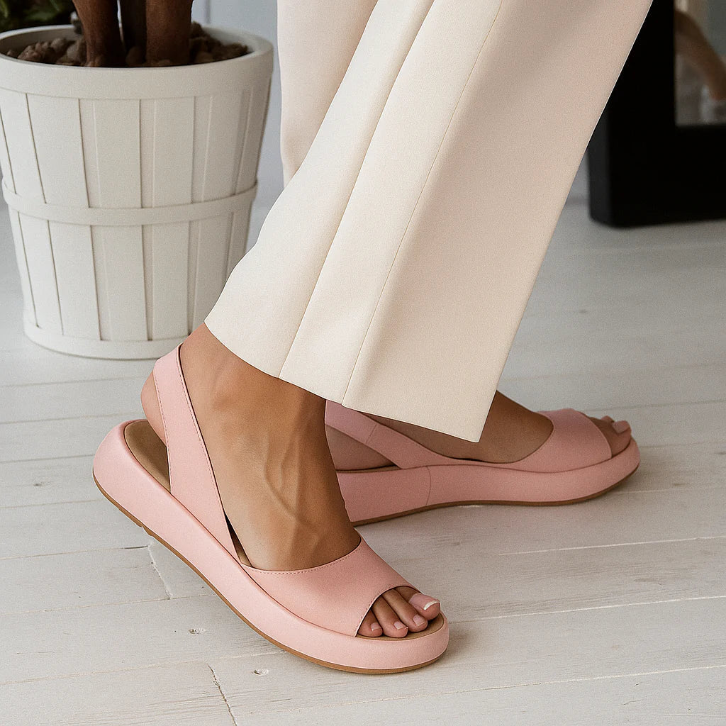 Women's slingback sandals, light pink open-toe slip-on with cushioned sole.