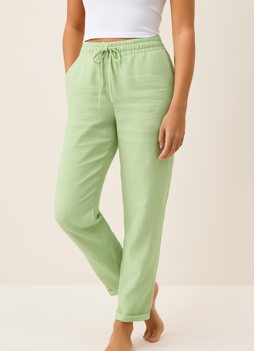 Green wide-leg drawstring trousers with relaxed fit and cuffed hem