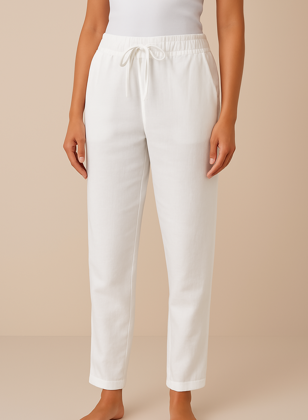 White wide-leg drawstring trousers with relaxed fit, elastic waist and drawstring