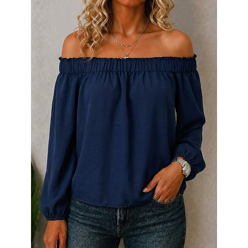 Navy off-shoulder top with gathered elastic neckline and long puff sleeves