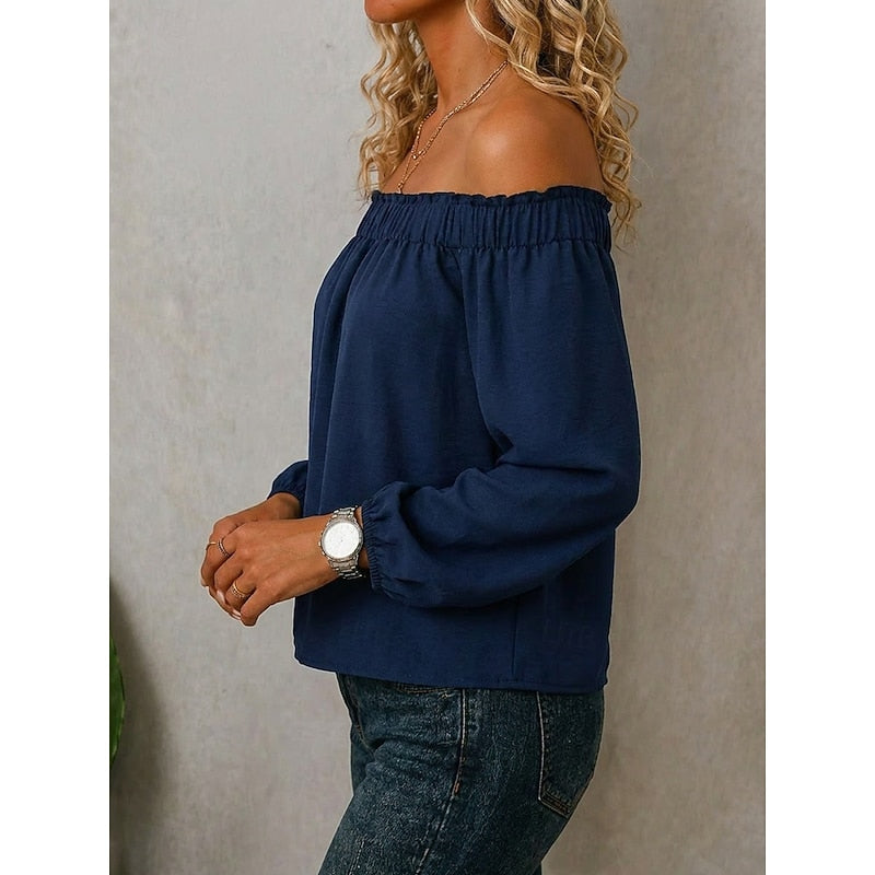 Navy off-shoulder blouse with smocked neckline and long balloon sleeves