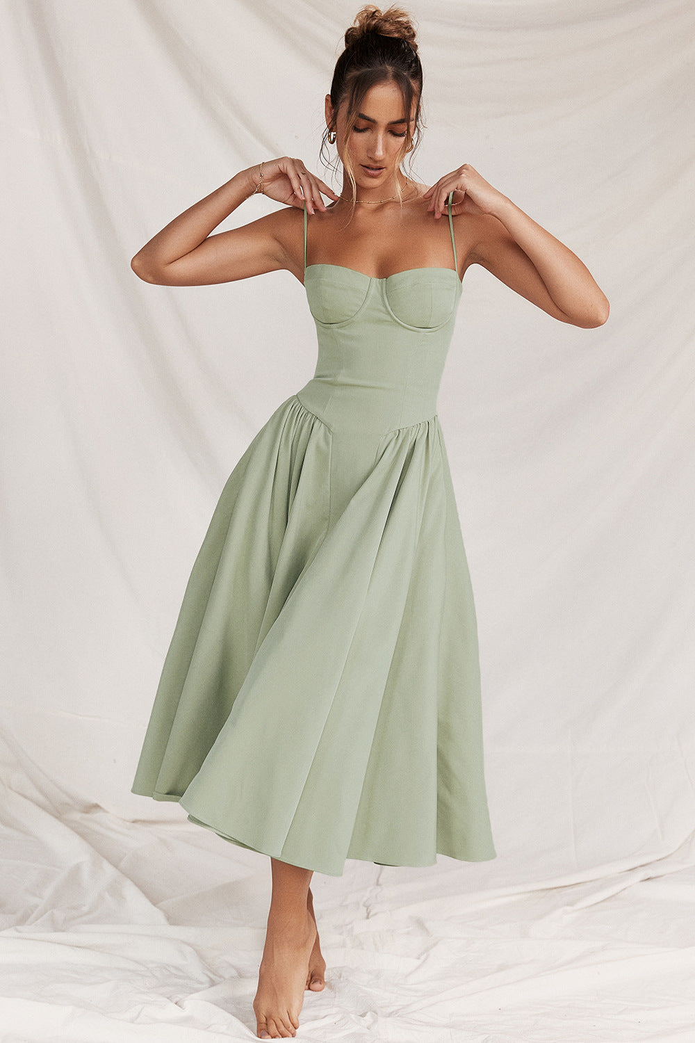 Light green corset midi dress with sweetheart neckline and adjustable spaghetti straps
