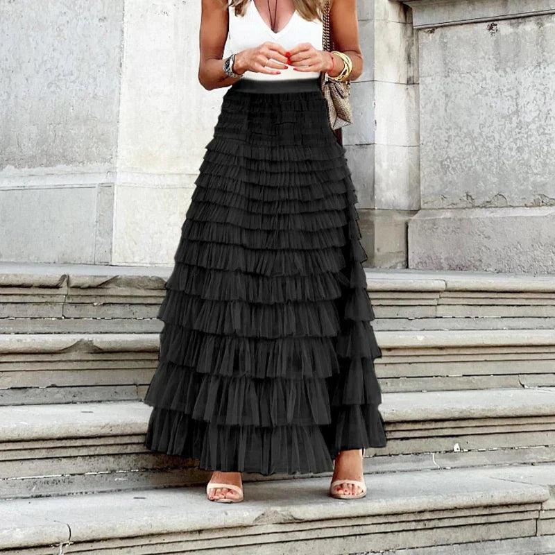 Women's black midi pleated mesh skirt with tiered ruffle layers and elastic waistband