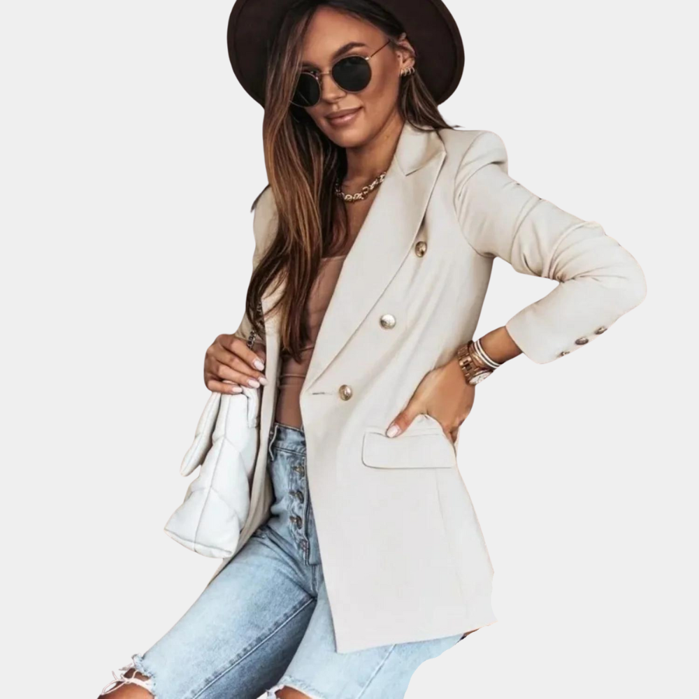 Off-white tailored blazer with gold buttons, peak lapels, and flap pockets