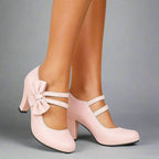 Pink bow detail heeled pumps with ankle strap and T-bar cutout, block heel