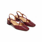 Red slingback heels with ankle strap and block heel