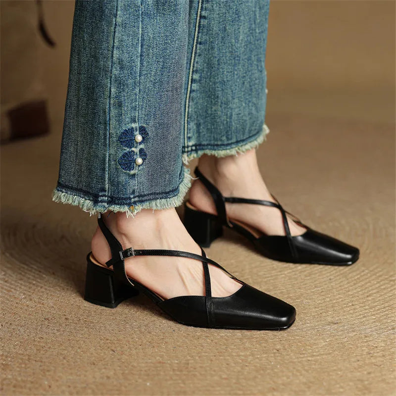 Black slingback heels with ankle strap and low block heel