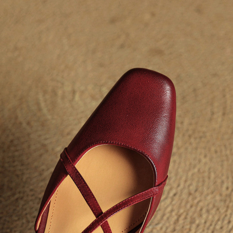 Red slingback heel with open toe and crossed straps, leather upper