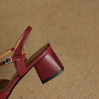 Red slingback heel with ankle buckle strap and chunky block heel