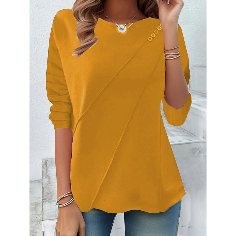 Yellow draped button-detail top with diagonal wrap front and roll sleeves