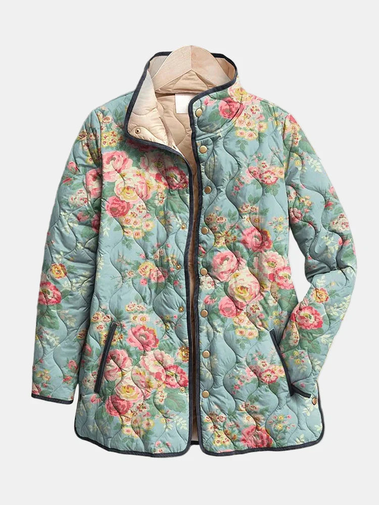 Quilted floral print jacket with hood, light blue with pink and green flowers, front zipper