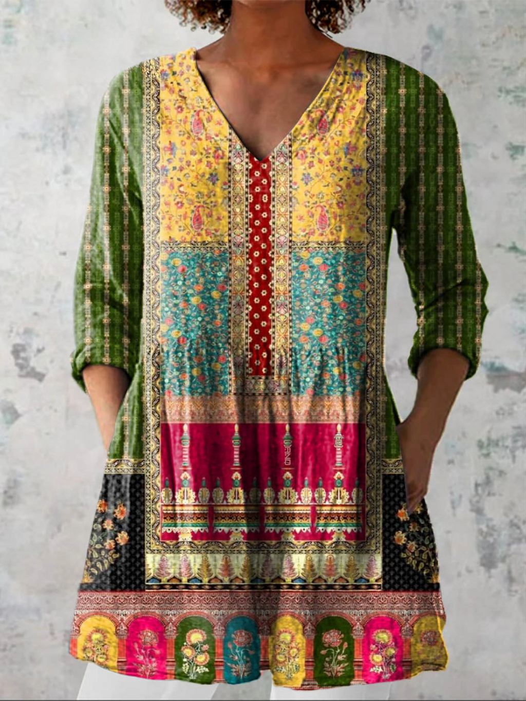 Women’s multicolor patterned V-neck blouse with button placket and three-quarter sleeves