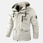 White hooded waterproof outdoor jacket with front zip and snap pockets