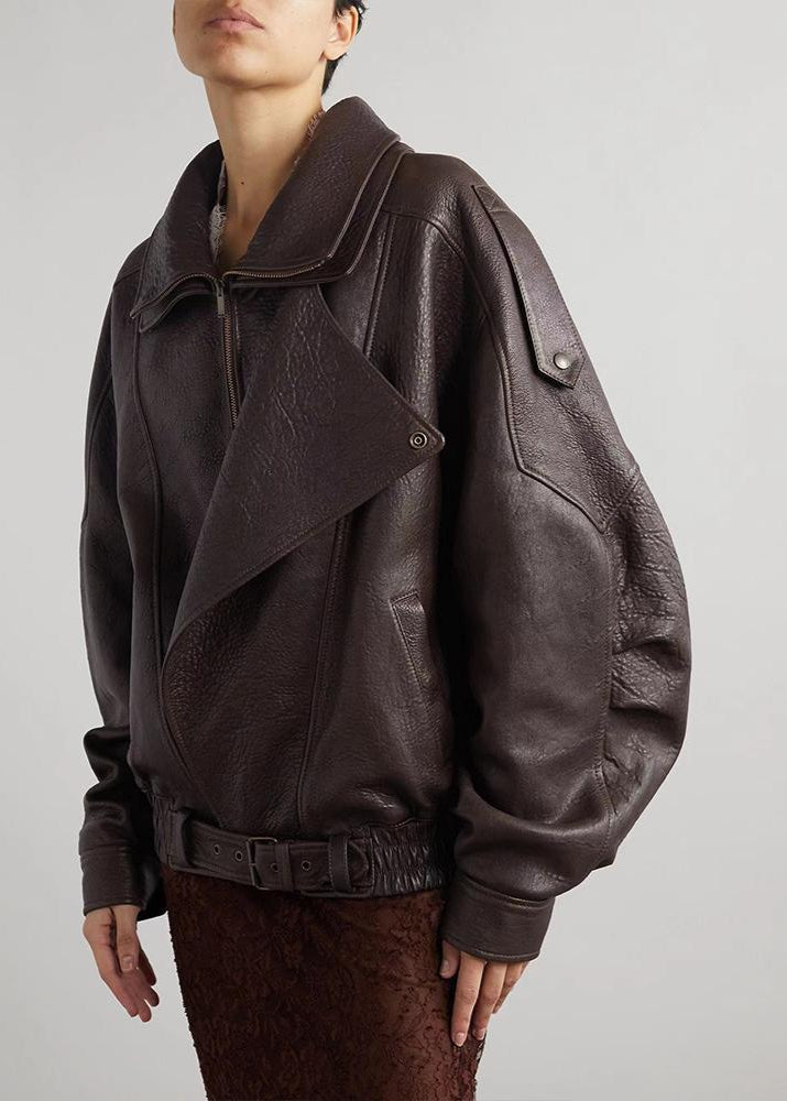 Women’s oversized dark brown leather bomber jacket with snap flap collar and zip
