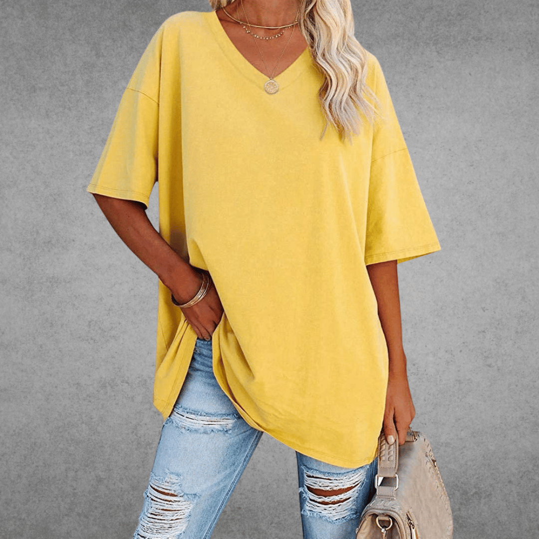 Women’s oversized V-neck T-shirt, mustard yellow; loose fit short sleeves with draped front.