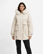 Women’s hooded winter parka in light color, faux-fur hood trim, front zip, side pockets