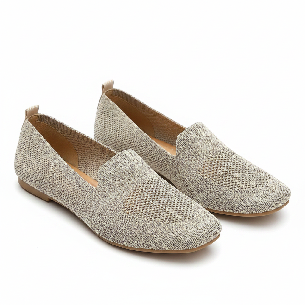 Beige perforated knit slip-on loafer flats with V-cut vamp and flat sole