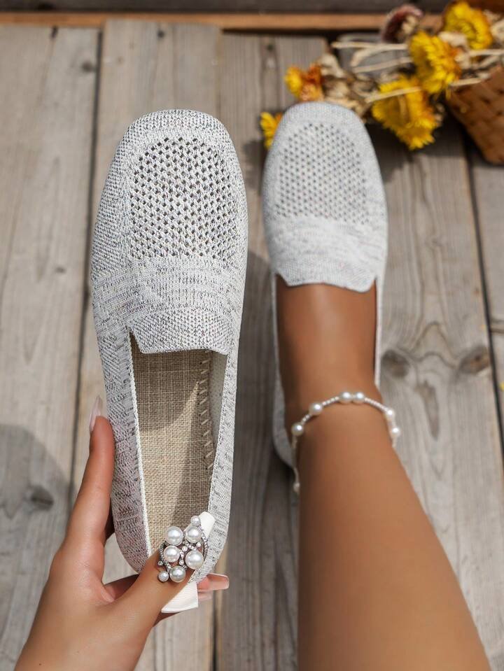 White perforated knit slip-on loafer flats with low flat sole