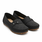 Black suede loafers with round toe, moc stitching, and hook-and-eye strap