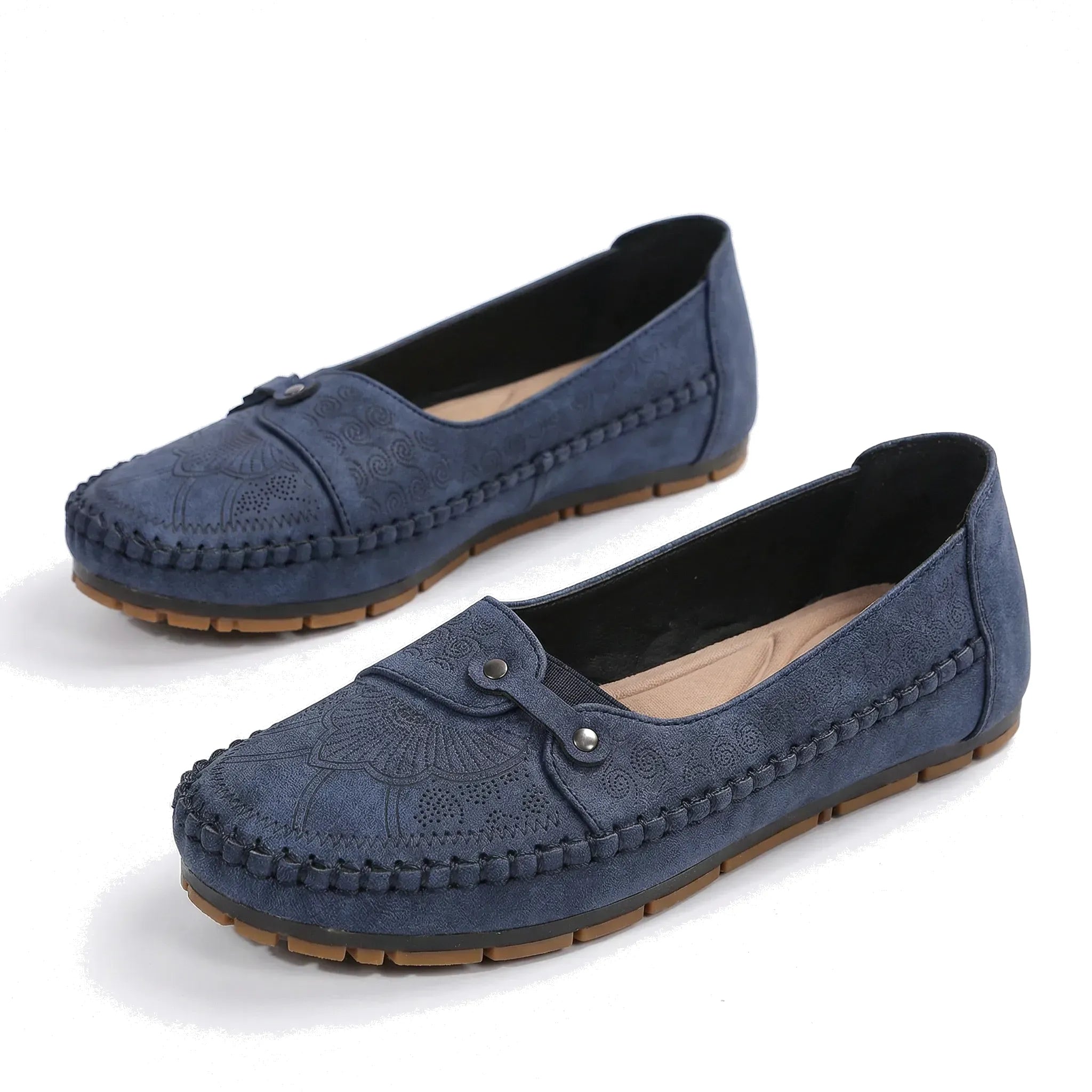 Navy blue suede loafers with round toe, moc stitching, and hook-and-eye strap