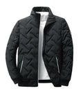 Black puffer jacket with chevron quilting, zip front, and two zip pockets.