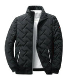 Black puffer jacket with chevron quilting, zip front, and two zip pockets.