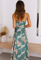 Green floral sleeveless maxi dress with open back and thin strappy ties