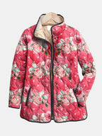 Pink floral quilted jacket with full zip, snap placket, and stand collar