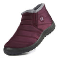 Winter slip-on boots in deep burgundy with gray faux-fur lining and padded seams