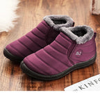 Burgundy winter slip-on boots with gray faux-fur collar and textured black sole