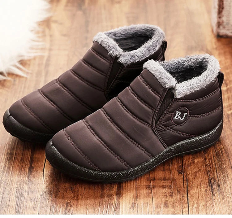 Brown winter slip-on boots with gray faux-fur lining and black rubber tread sole
