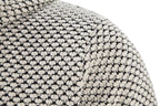 Men’s knit sweater fabric detail, beige and dark speckled texture with stitched pattern.