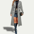 Gray long double-breasted coat with open front, structured lapels, and double button rows