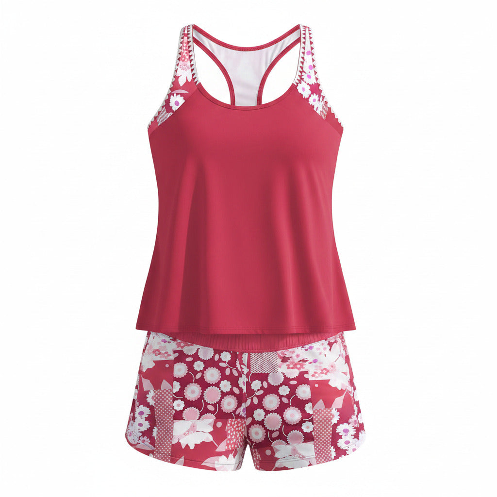 Pink floral racerback tankini set with matching boy shorts, studio view