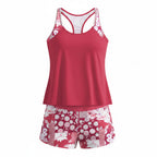 Pink floral racerback tankini set with matching boy shorts, studio view