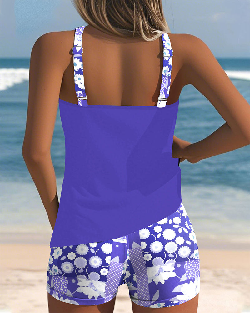 Purple racerback tankini top with back cutout and floral boy shorts set