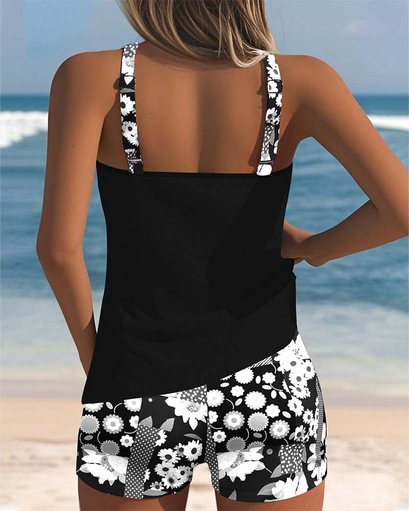 Black racerback tankini top with back cutout and floral boy shorts set