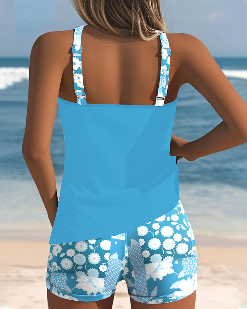 Light blue racerback tankini top with back cutout and floral boy shorts set